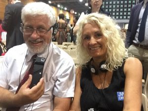 We had headsets to listen to the English interpreters.