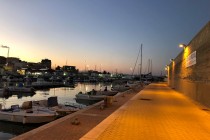Crotone harbour at dusk.